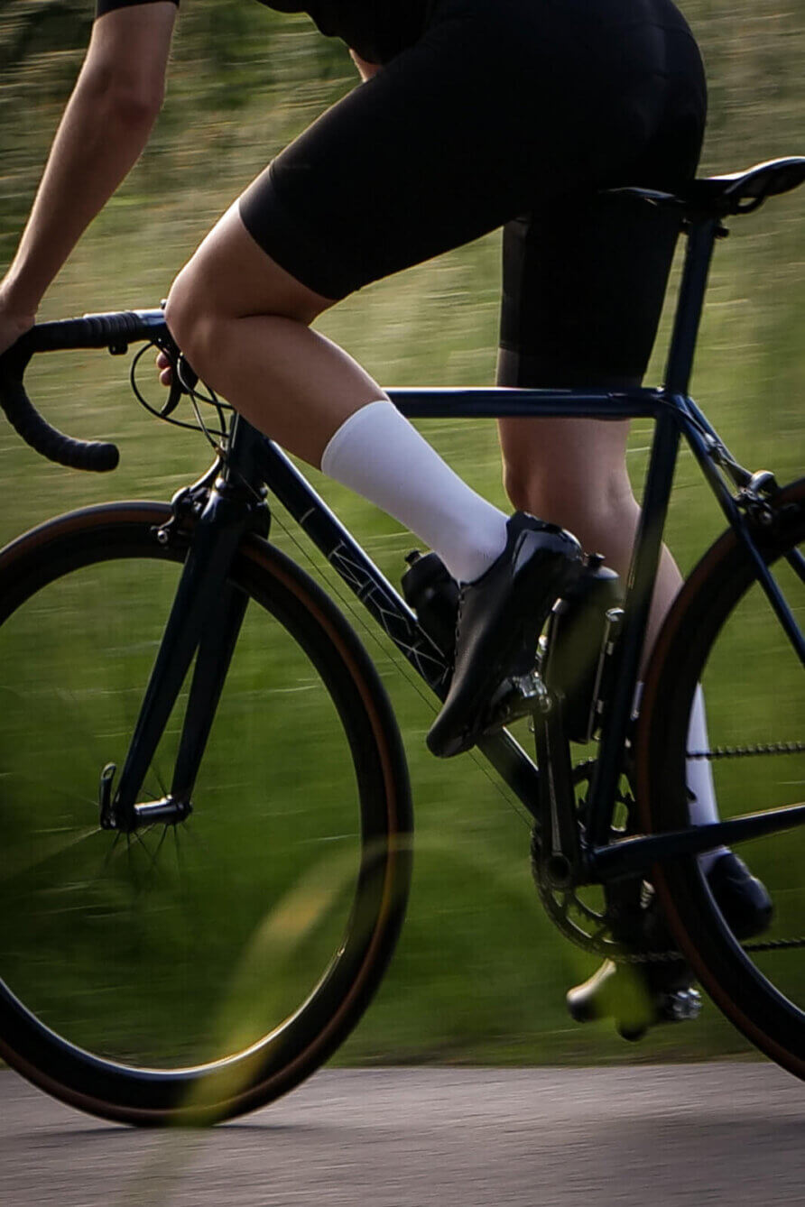 white nologo cycling socks in motion