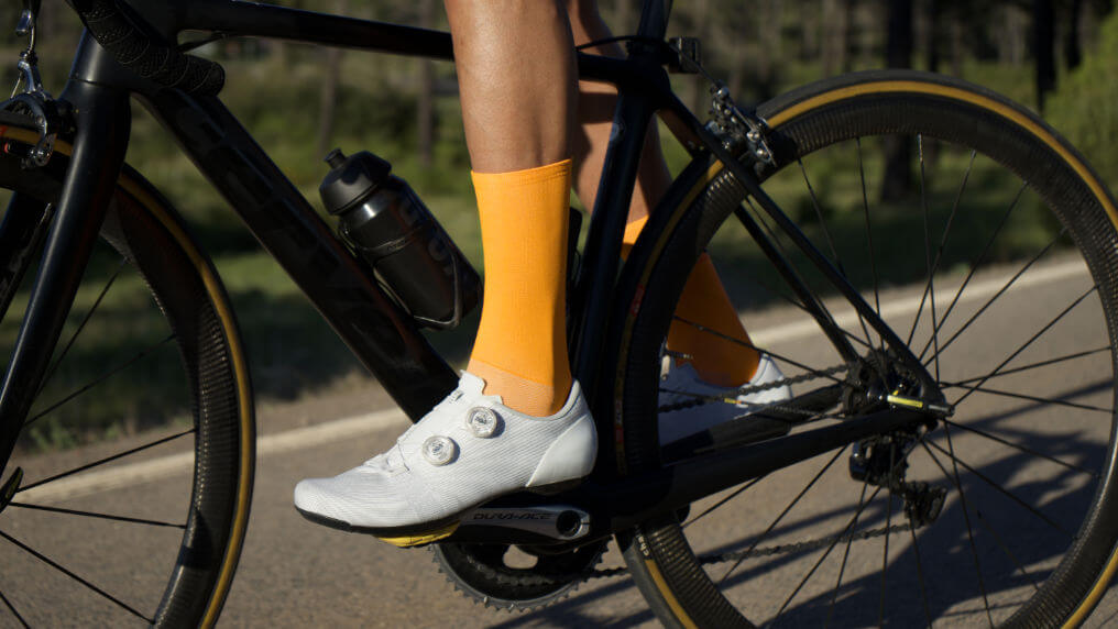 mango nologo cycling socks with shoes and bicycle